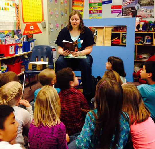 Heather at a school reading